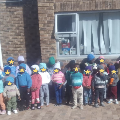 Kids at Sam's Crèche with their new jerseys_May 2022